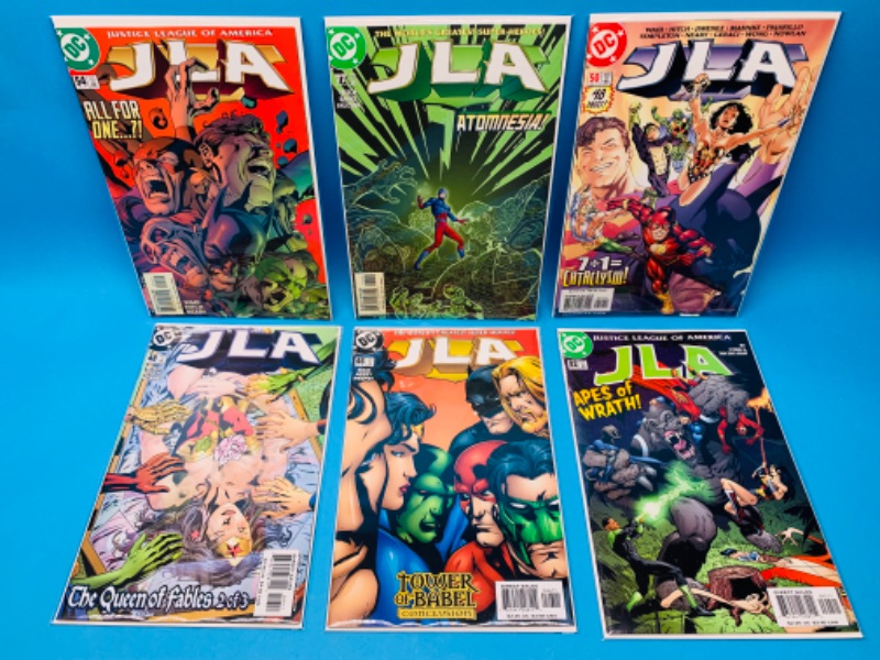 Photo 1 of 462390…6 JLA comics in plastic sleeves 