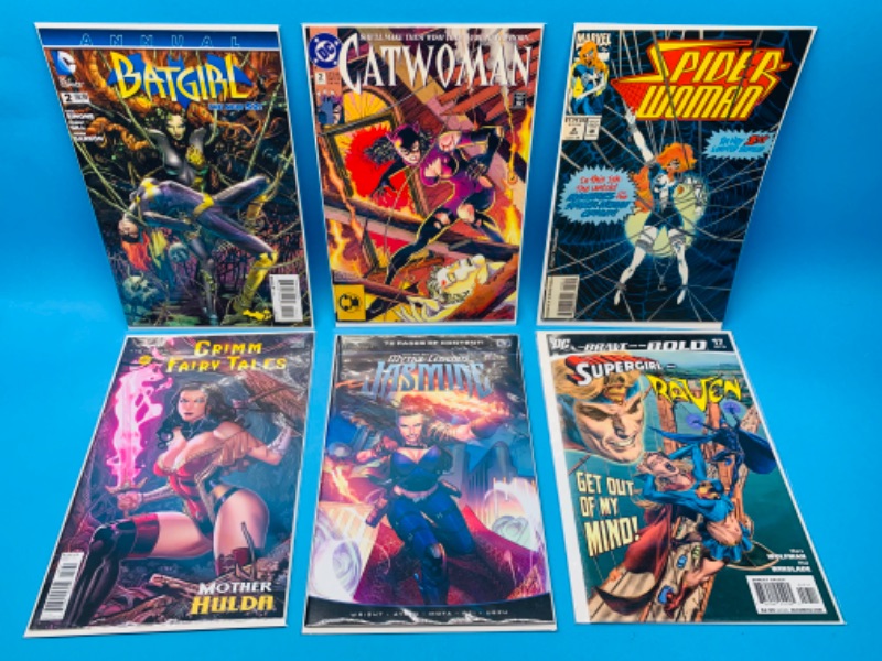 Photo 1 of 462448… 6 female superhero  comics in plastic sleeves 