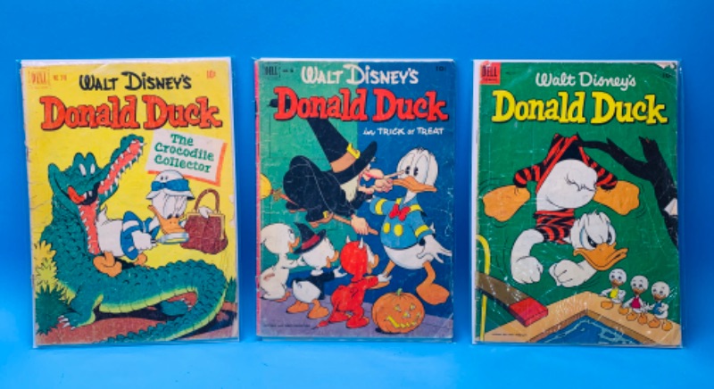 Photo 1 of 462463… condition issues- vintage $.10 Walt Disney comics in sleeves 