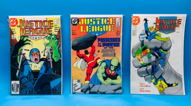 Photo 1 of 462466…3 vintage $.75 justice league comics in plastic sleeves 