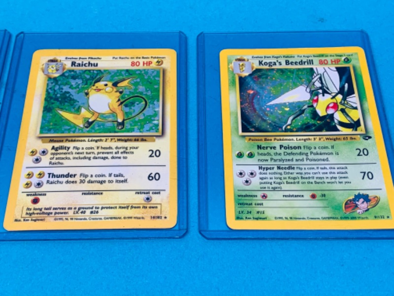 Photo 4 of 462491…4 Pokémon holo cards -corners show wear- in hard sleeves dates 1999-2000