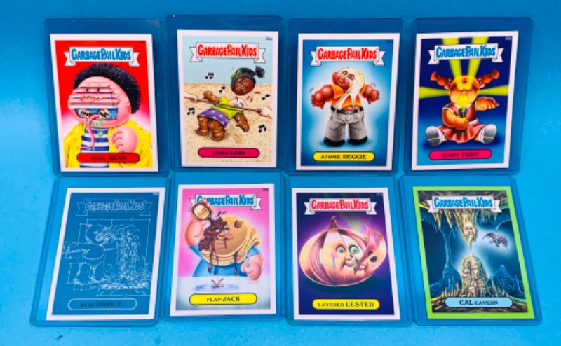 Photo 1 of 462494…8 garbage pail kids cards in hard sleeves with puzzle on back sides