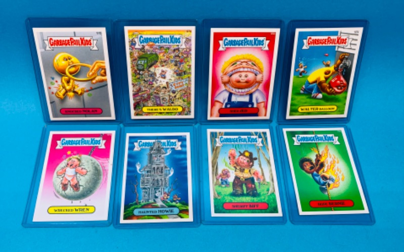 Photo 1 of 462495… 8 garbage pail kids cards in hard sleeves with puzzle on back sides