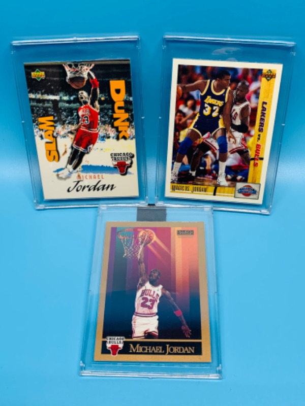 Photo 1 of 494465…3 Michael Jordan trading cards in hard plastic cases 