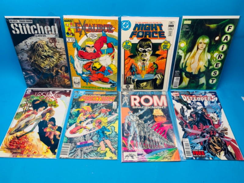 Photo 1 of 494606…8 comics in plastic sleeves 