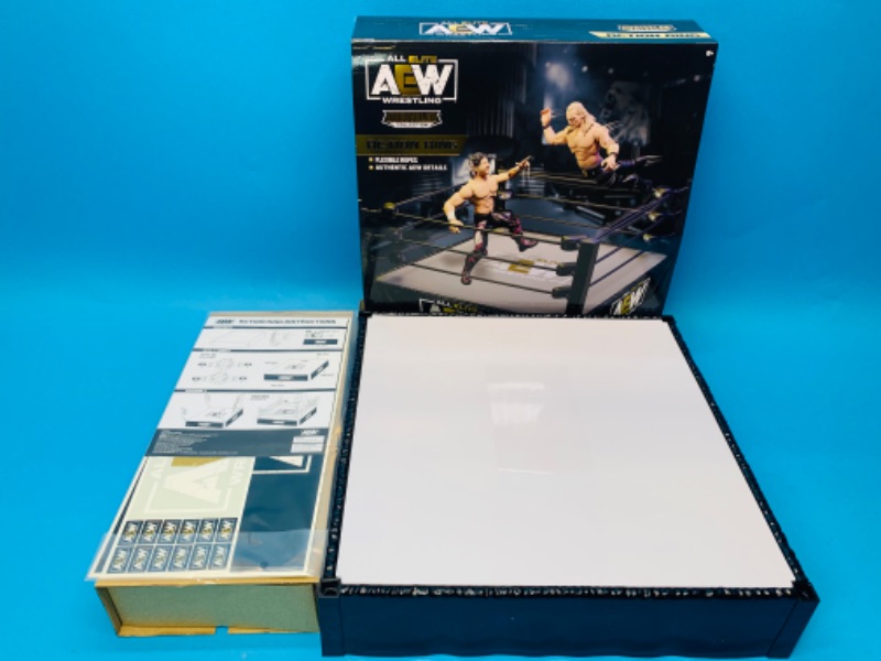 Photo 1 of 494669… AEW unrivaled collection action wrestling ring with flexible ropes in box