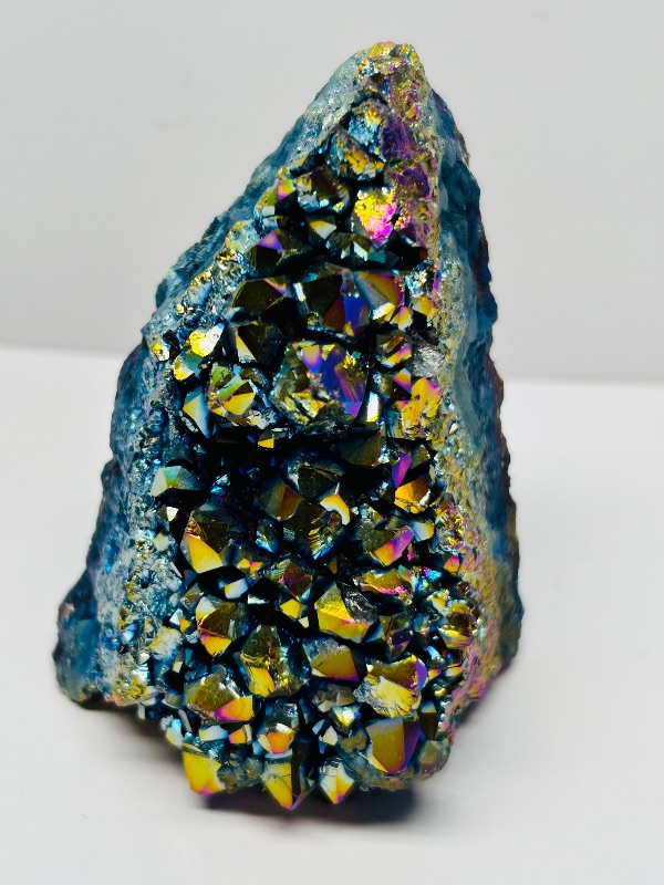Photo 1 of 494969…rainbow electroplated titanium rock in 3 x 3” acrylic case
