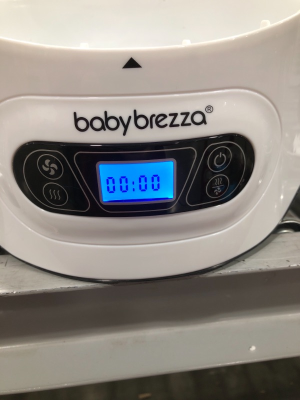 Photo 3 of Baby Brezza Baby Bottle Sterilizer and Dryer Machine – Electric Steam Sterilization - Universal Fit - Pacifiers, Glass, Plastic, and Newborn Feeding Bottles
