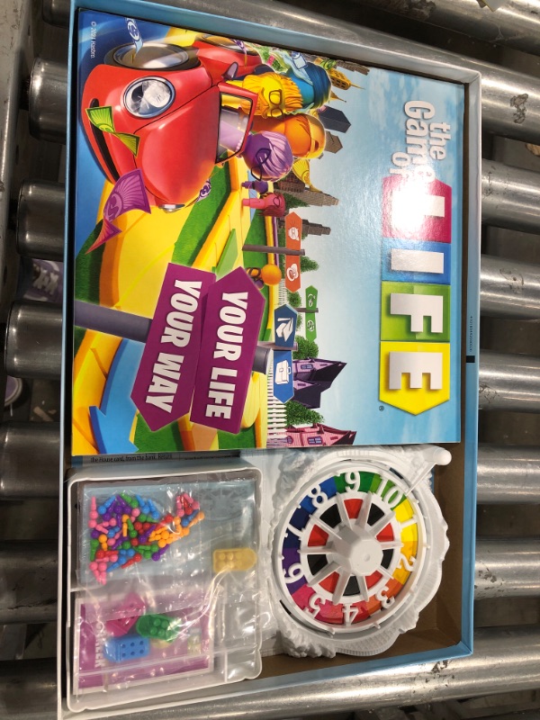 Photo 2 of Hasbro Gaming The Game of Life Game, Family Board Game for 2-4 Players, Indoor Game for Kids Ages 8 and Up, Pegs Come in 6 Colors
