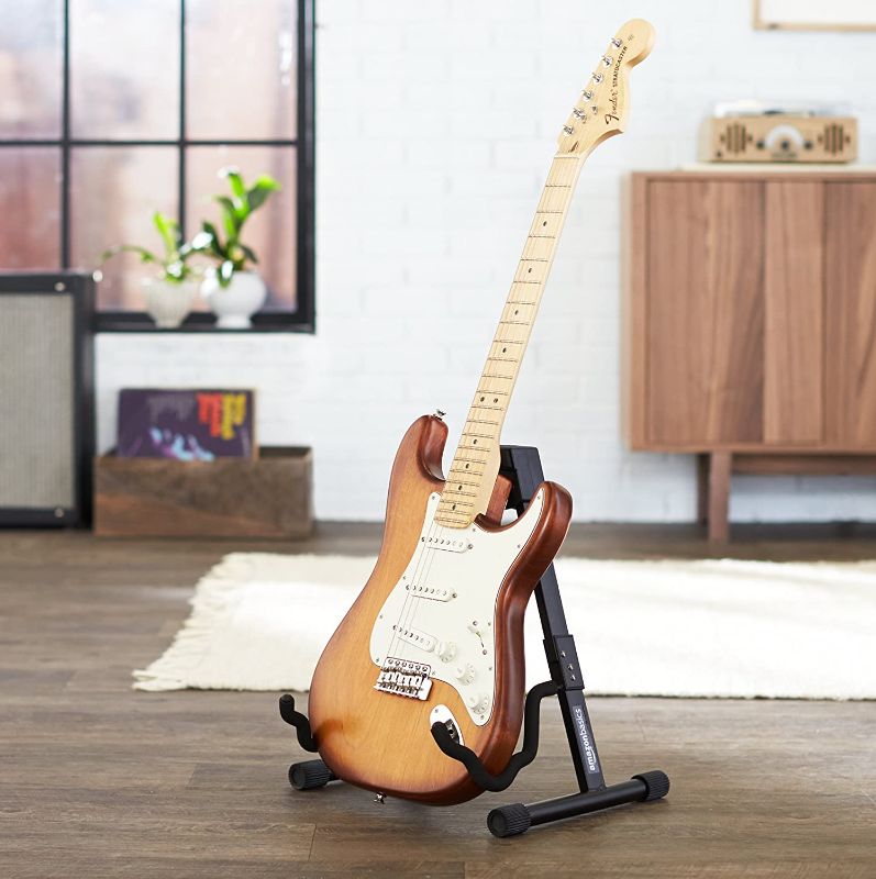 Photo 1 of Amazon Basics Guitar Folding A-Frame Stand for Acoustic and Electric Guitars
