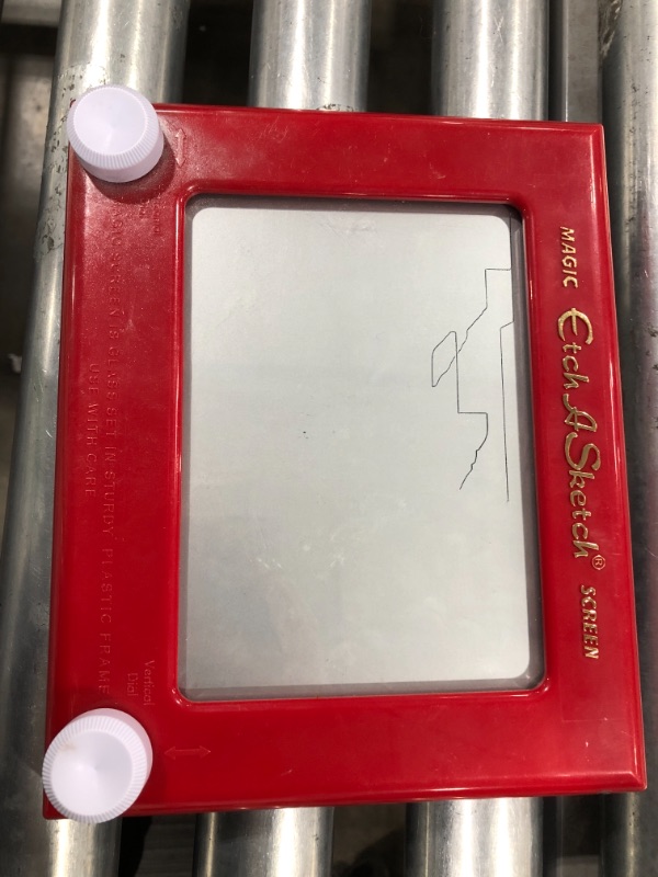 Photo 2 of Etch A Sketch, Classic Red Drawing Toy with Magic Screen, for Ages 3 and Up
