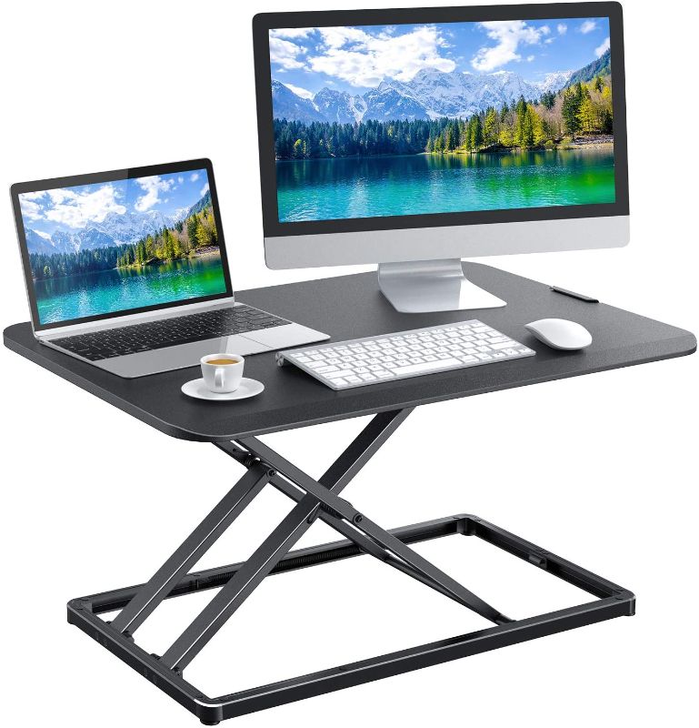 Photo 1 of Standing Desk Converter Height Adjustable Sit to Stand Desktop Desk Gas Spring Riser, Perfect Workstation 28.5 inches for Laptop & Computer Monitors by HUANUO
