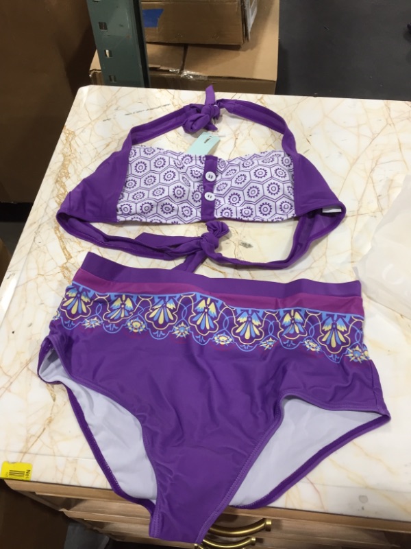 Photo 1 of Dresseo purple and yellow swimsuit bottom
WHITE AND PURPLE TOP
XL SIZE