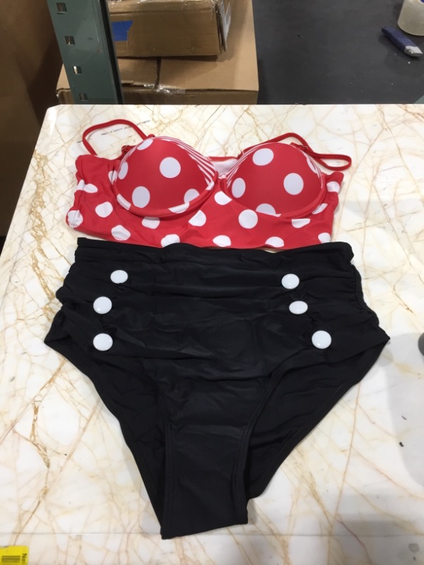 Photo 1 of Dresseo red swimsuit with white polka dots
SIZE LARGE