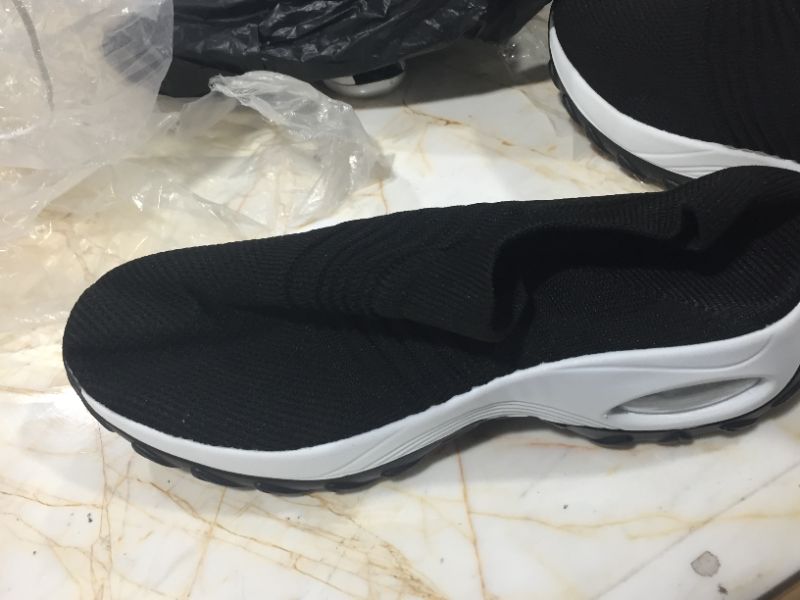 Photo 2 of BLACK AND WHITE WORKOUT SHOES
UNKNOWN SIZE