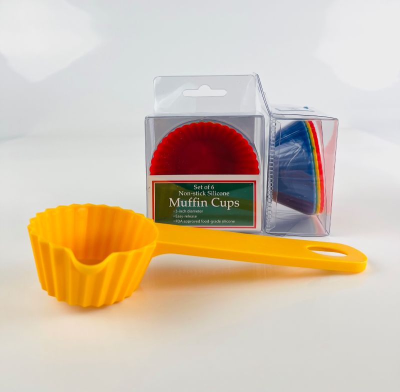 Photo 1 of TWO 6 PACKS OF SILICONE MUFFIN LINERS AND A MUFFIN MEASURING CUP NEW $24.99