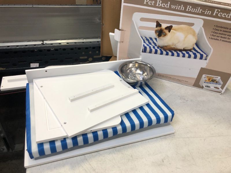 Photo 2 of ELEVATED SMALL PET SOFA BED WITH PULLOUT FEEDER COMFY AND EASY TO CLEAN METAL BASINS INCLUDED COLOR WHITE NEW IN BOX $65