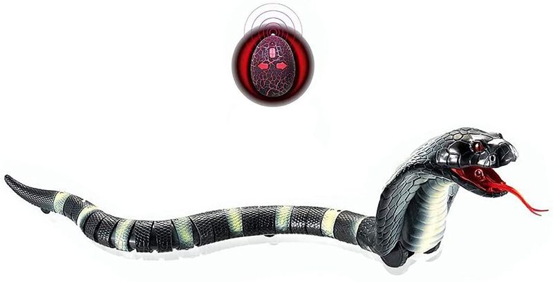 Photo 1 of NAJA COBRA SNAKE REALISTIC WITH SWINGING TAIL AND SLITHERING TONGUE USB CHARGEABLE CONTROLLER USES 3 LR44 BATTERIES NOT INCLUDED NEW IN BOX $20.99