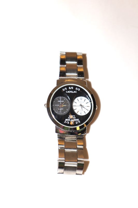 Photo 1 of STAINLESS STEEL BLACK WATER RESISTANT WATCH NEW$24.95