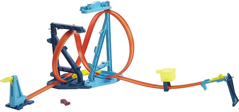 Photo 1 of Hot Wheels Track Builder Unlimited Infinity Loop Kit with Adjustable Set-Ups & Jump That Flips Cars into Catch Cup for Kids 6 to 12 Years Old with One 1:64 Scale Hot Wheels Vehicle
