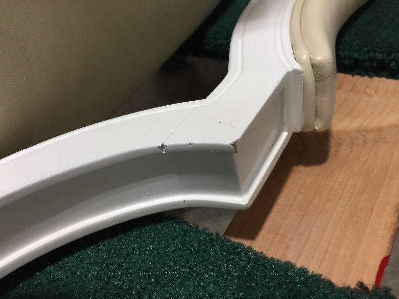Photo 1 of FAUX LEATHER WHITE DINING CHAIR 21L X 23W X 37H INCHES