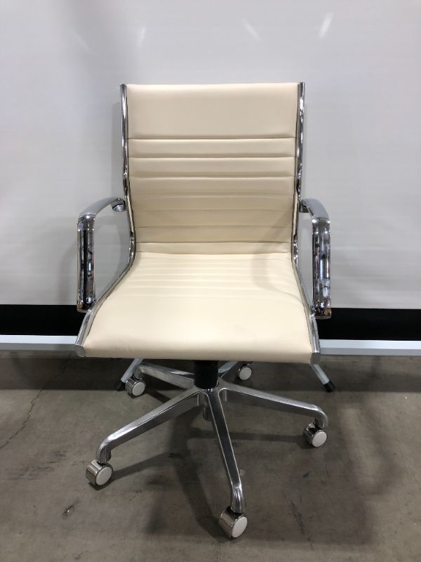 Photo 1 of CREME FAUX LEATHER OFFICE CHAIR WITH METAL ARM RESTS  36H X 20W INCHES 