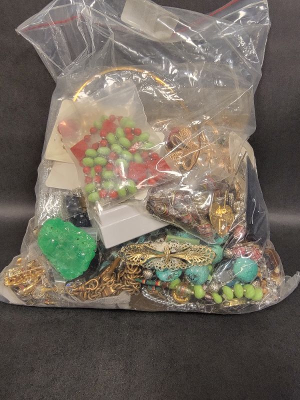 Photo 1 of BAG OF COSTUME JEWELRY