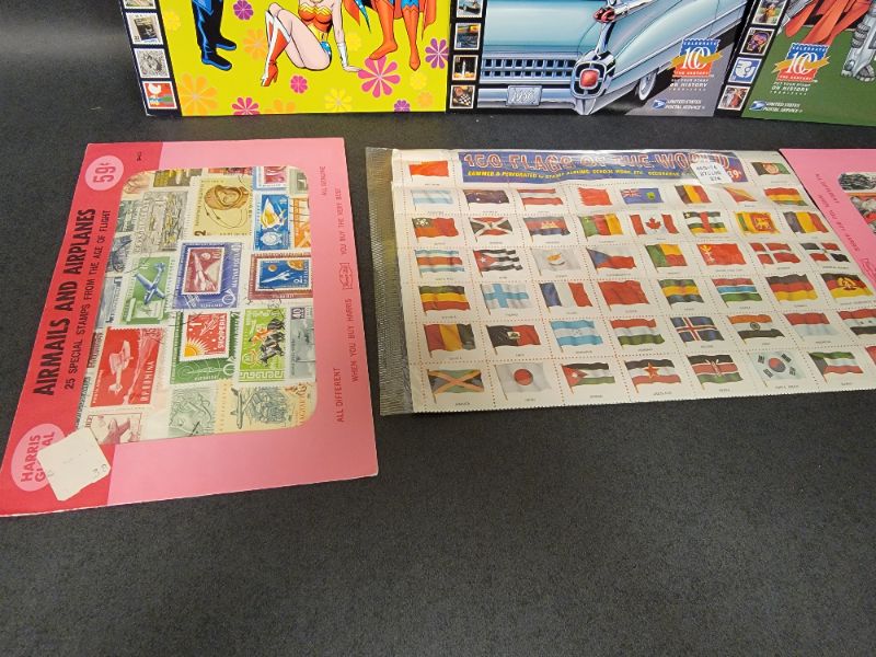 Photo 2 of 3 Super Heroes Stamp Albums (unused) and Flags and Airplane Stamps