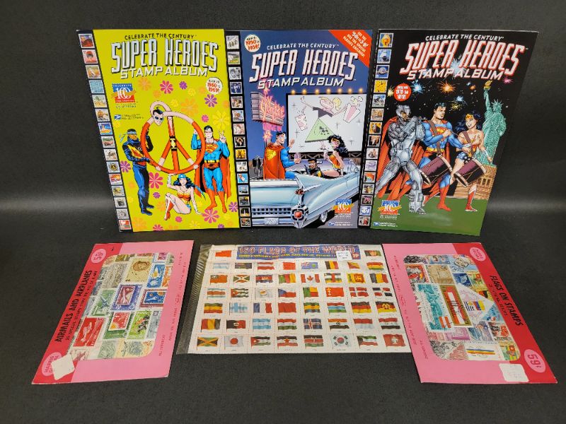 Photo 1 of 3 Super Heroes Stamp Albums (unused) and Flags and Airplane Stamps