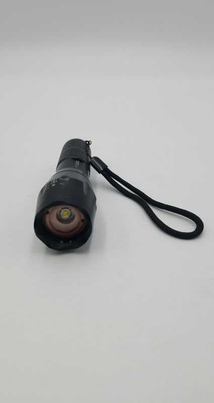 Photo 1 of RT1000 LED METAL FLASHLIGHT WITH ZOOM UP TO X2000 WRIST STRAP BLACK  NEW 