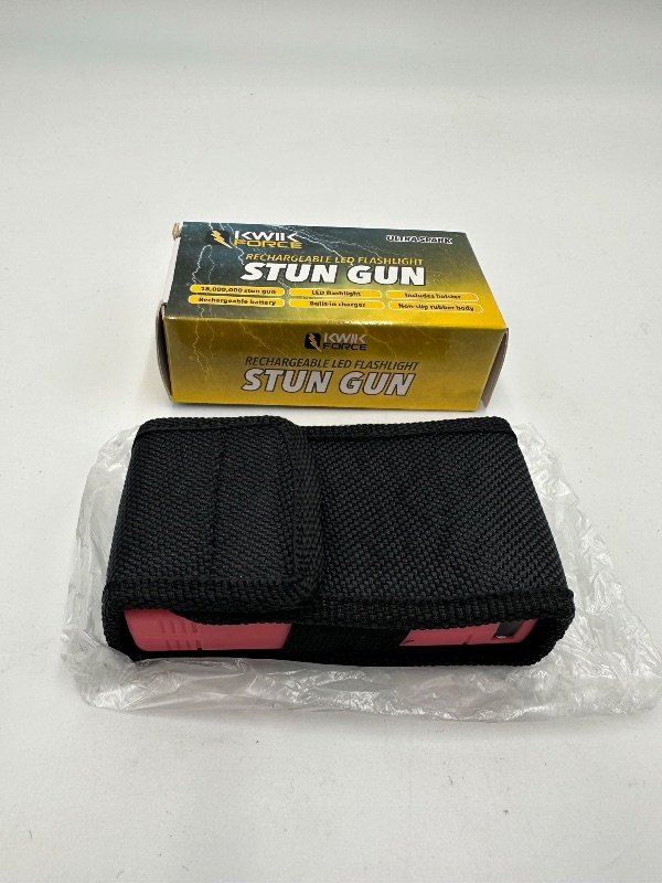 Photo 1 of STUN GUN PINK WITH CARRYING CASE LED FLASHLIGHT RECHARGEABLE NEW