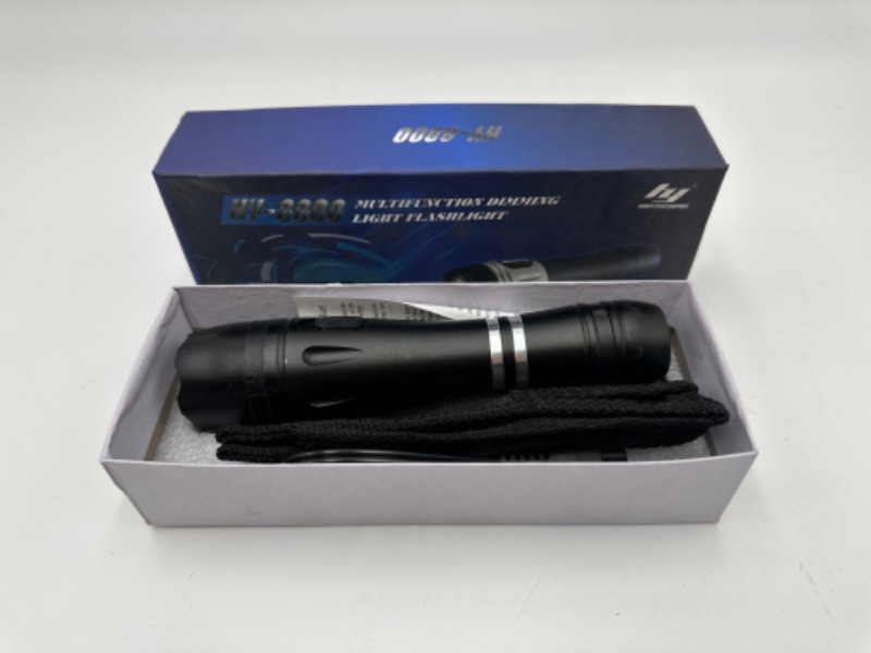 Photo 1 of MULTIFUNCTION DIMMING LIGHT FLASHLIGHT STUN GUN NEW