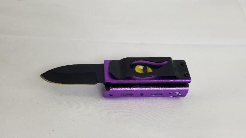 Photo 1 of MINI CLIP POCKET KNIFE AND LIGHTER HOLDER NEW 