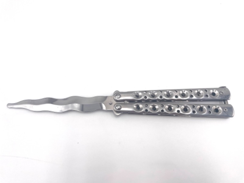 Photo 1 of SWIGGLY SILVER BUTTERFLY KNIFE NEW 