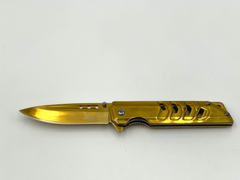 Photo 1 of GOLD FALCON POCKET KNIFE WITH WINDOW BREAKER NEW