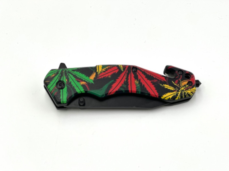 Photo 3 of COLORFUL HEMP LEAF DESIGN POCKET KNIFE WITH WINDOW BREAKER AND SEAT BELT CUTTER NEW 