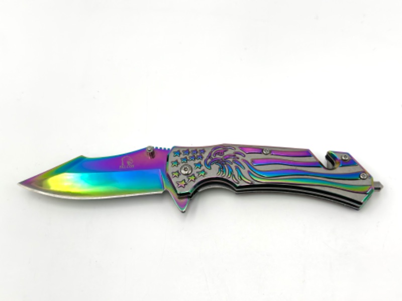 Photo 1 of OIL SLICK STARS AND STRIPES FALCON POCKET KNIFE WITH WINDOW BREAKER AND SEAT BELT CUTTER NEW