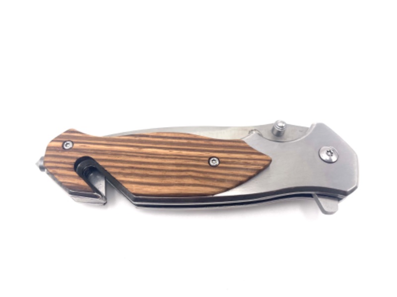 Photo 1 of SILVER AND WOOD PRINT POCKET KNIFE WITH WINDOE BREAKER AND SEATBELT CUTTER NEW