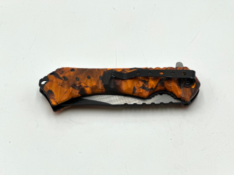 Photo 1 of ORANGE POCKET KNIFE NEW
