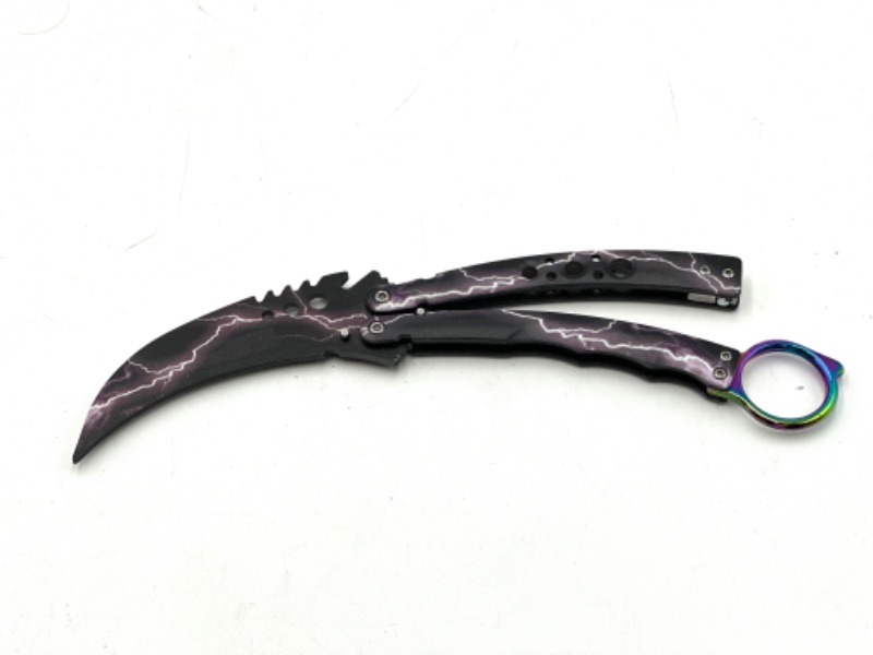 Photo 1 of PRACTICE BUTTERFLY KNIFE WITH LIGHTNING DESIGN NEW