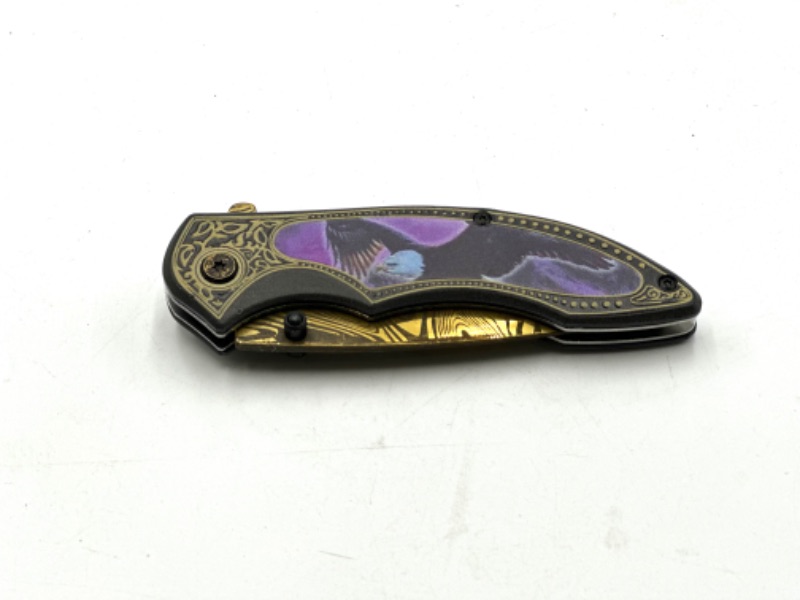 Photo 2 of PURPLE EAGLE DESIGN GOLD OIL SLICK POCKET KNIFE NEW