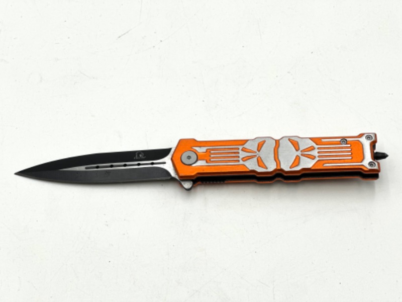 Photo 1 of ORANGE SKULL FALCON POCKET KNIFE WITH WINDOW BREAKER NEW