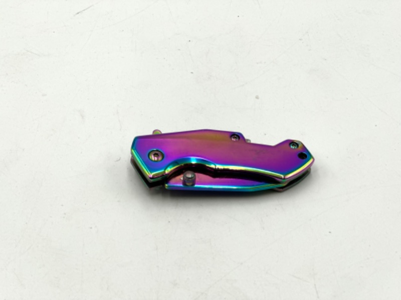 Photo 2 of OIL SLICK POCKET KNIFE NEW