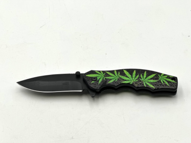 Photo 1 of BLACK AND GREEN HEMP FLOWER POCKET KNIFE NEW