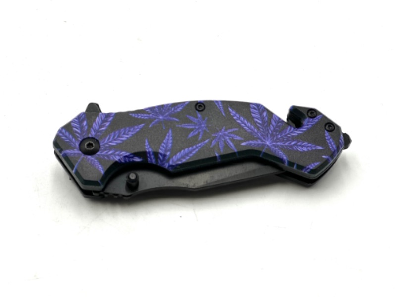 Photo 2 of PURPLE HEMP FLOWER DESIGN POCKET KNIFE WITH WINDOW BREAKER AND POCKET KNIFE NEW