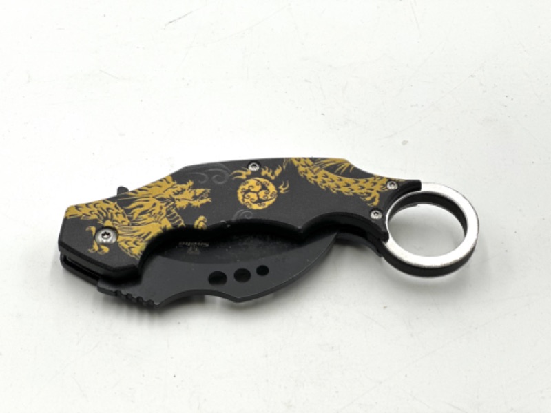 Photo 2 of YELLOW AND BLACK DRAGON DESIGN POCKET KNIFE NEW