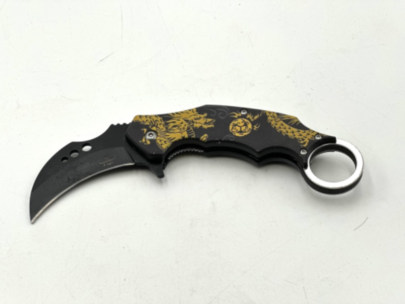 Photo 1 of YELLOW AND BLACK DRAGON DESIGN POCKET KNIFE NEW