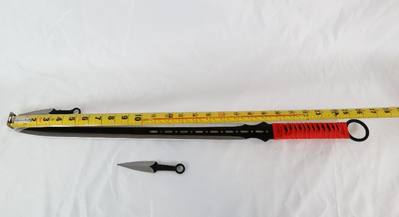 Photo 1 of FANTASY DUAL SIDED BLADE WI 2 THROWING KNIVES NEW 