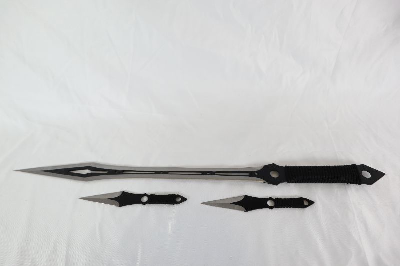 Photo 1 of DUAL SIDED FANTASY SWORD WITH 7.5 INCH THROWING NIVES NEW 