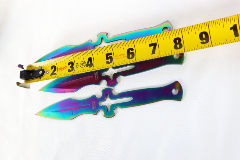 Photo 3 of OIL SLICK THROWING KNIVES SET OF 3 NEW